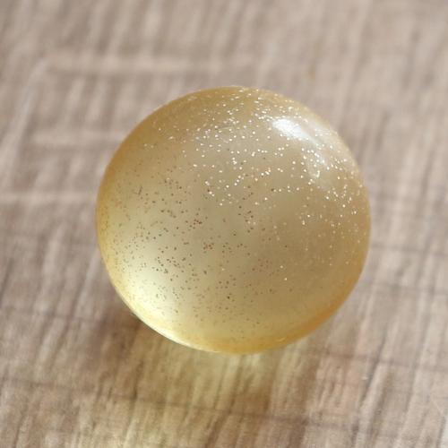 Perle de bain ronde transparente pailleté or